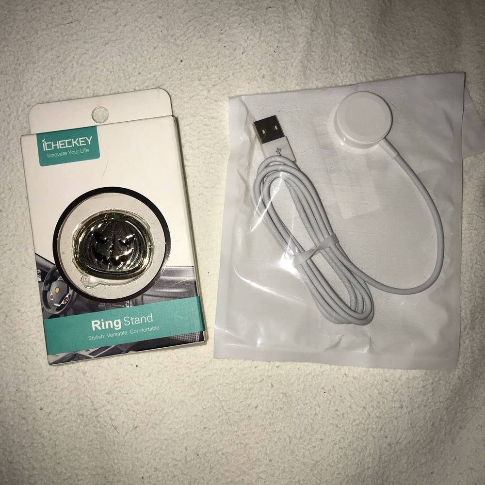 Apple Watch charger and a pumpkin Popsocket